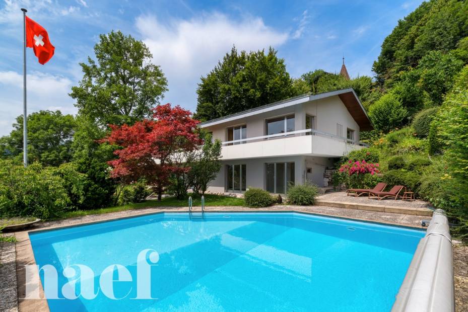 Belle villa avec vue sur le lac de 7.5 pièces dont un studio indépendant : Potentiel exceptionnel à révéler !