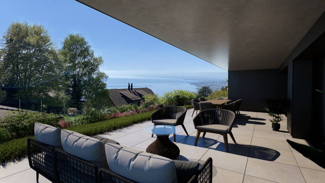 Superbe appartement de 4.5 pièces avec grand jardin et vue imprenable sur le lac.