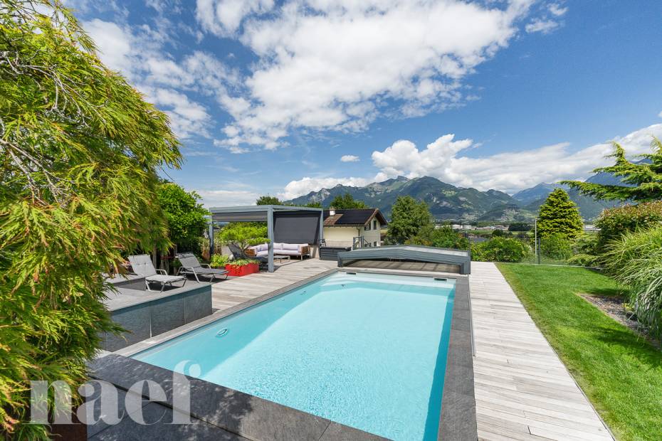 Maison d’architecte de 7.5 pièces avec piscine et jacuzzi dans un cadre verdoyant à vendre à Collombey-Muraz