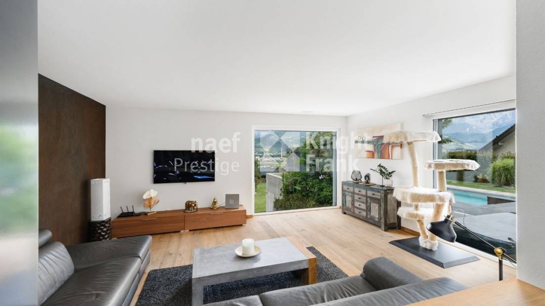 Maison d’architecte de 7.5 pièces avec piscine et jacuzzi dans un cadre verdoyant à vendre à Collombey-Muraz